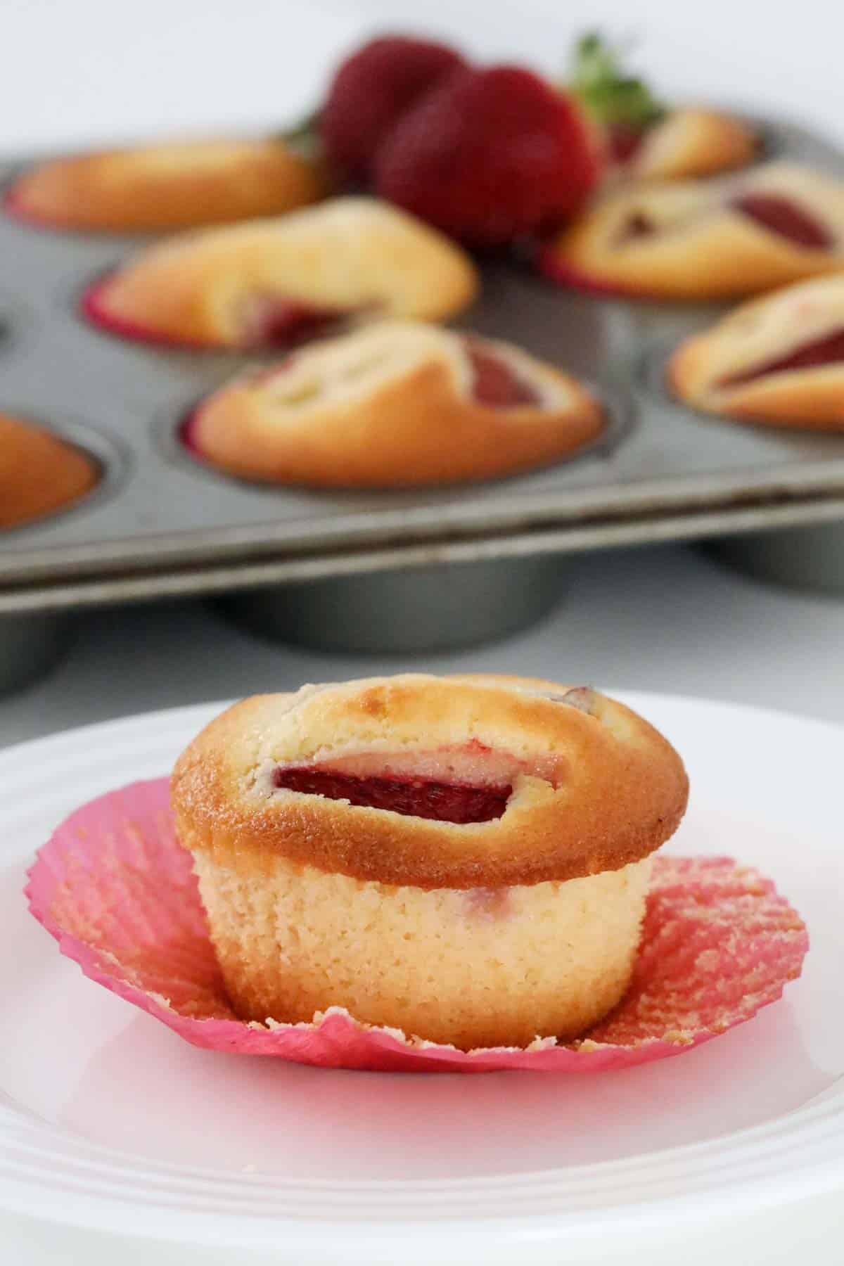 A fluffy, moist strawberry cupcake.