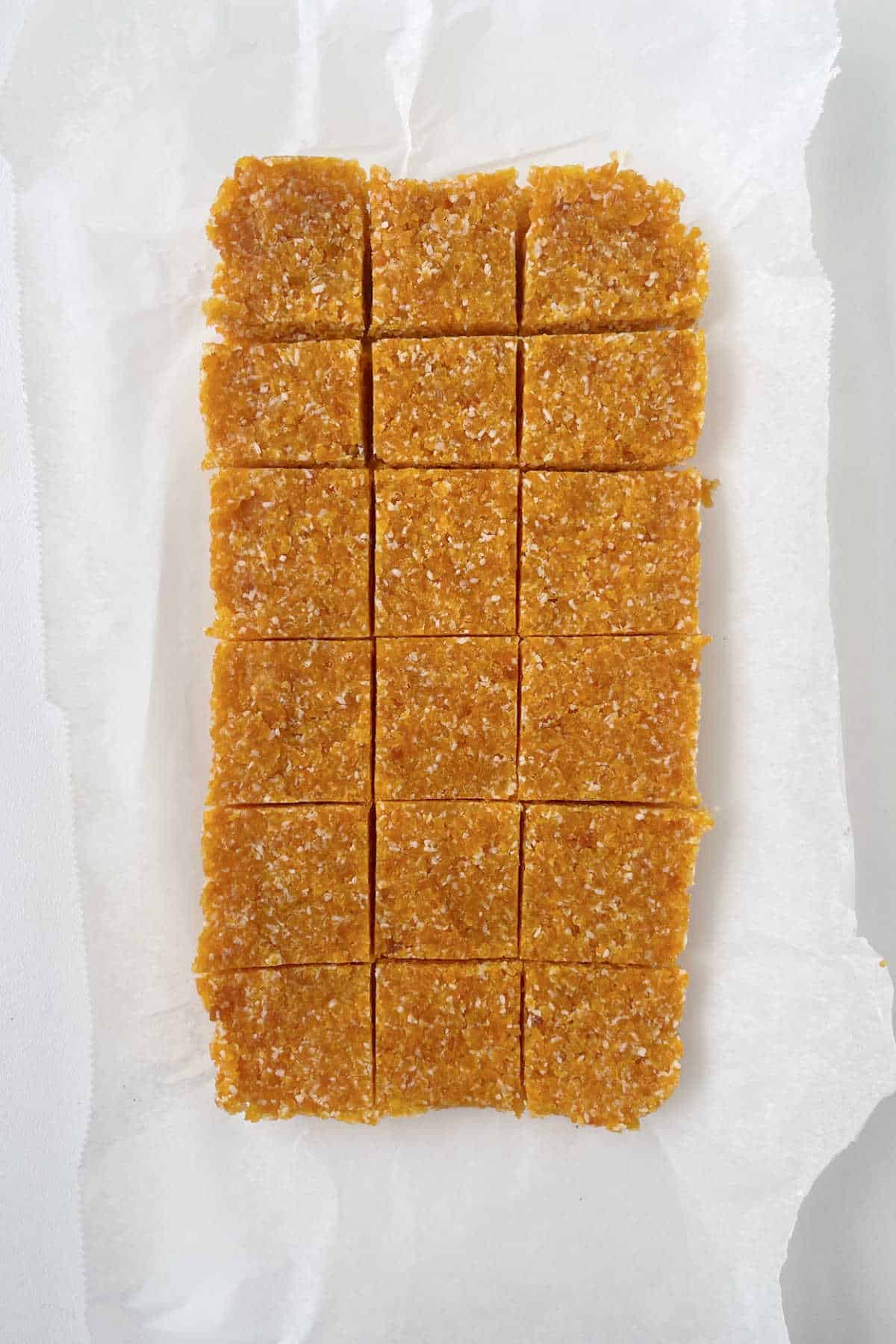 Apricot and Coconut Slice cut into squares.