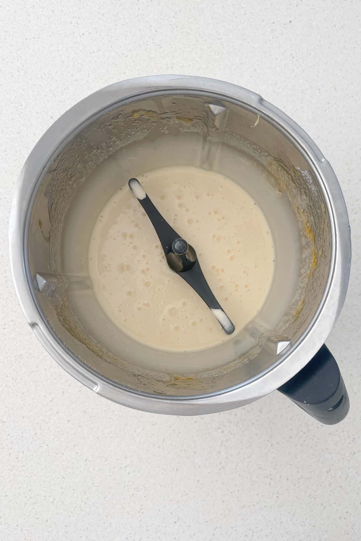 Whole Orange cake mixture in a thermomix bowl.