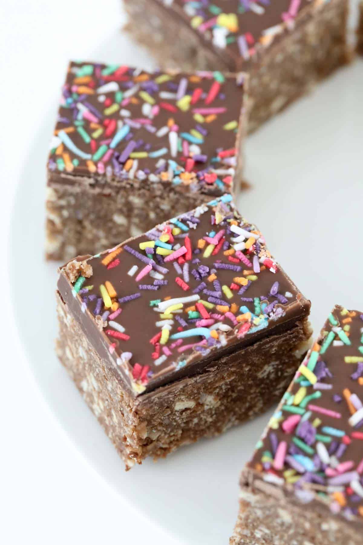 Sprinkles chocolate slice cut into pieces.