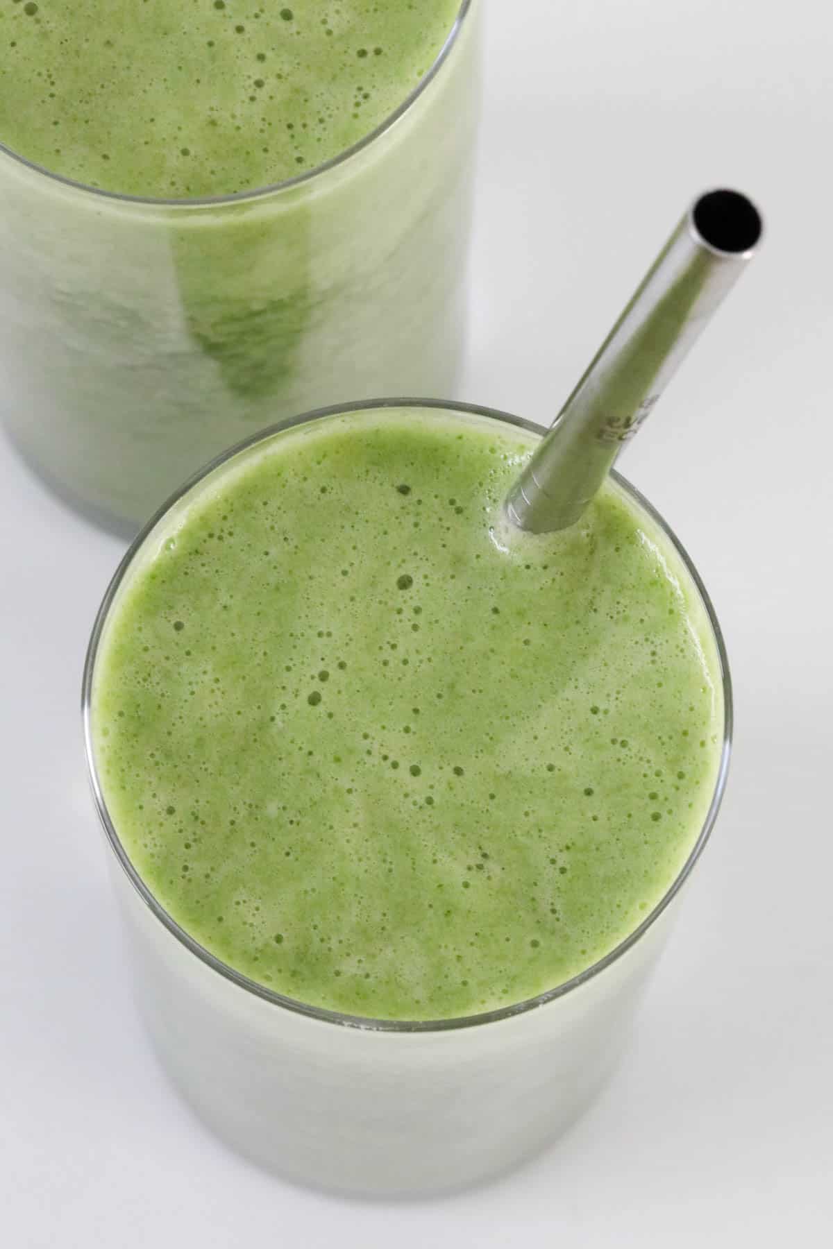 An overhead shot of a green smoothie.