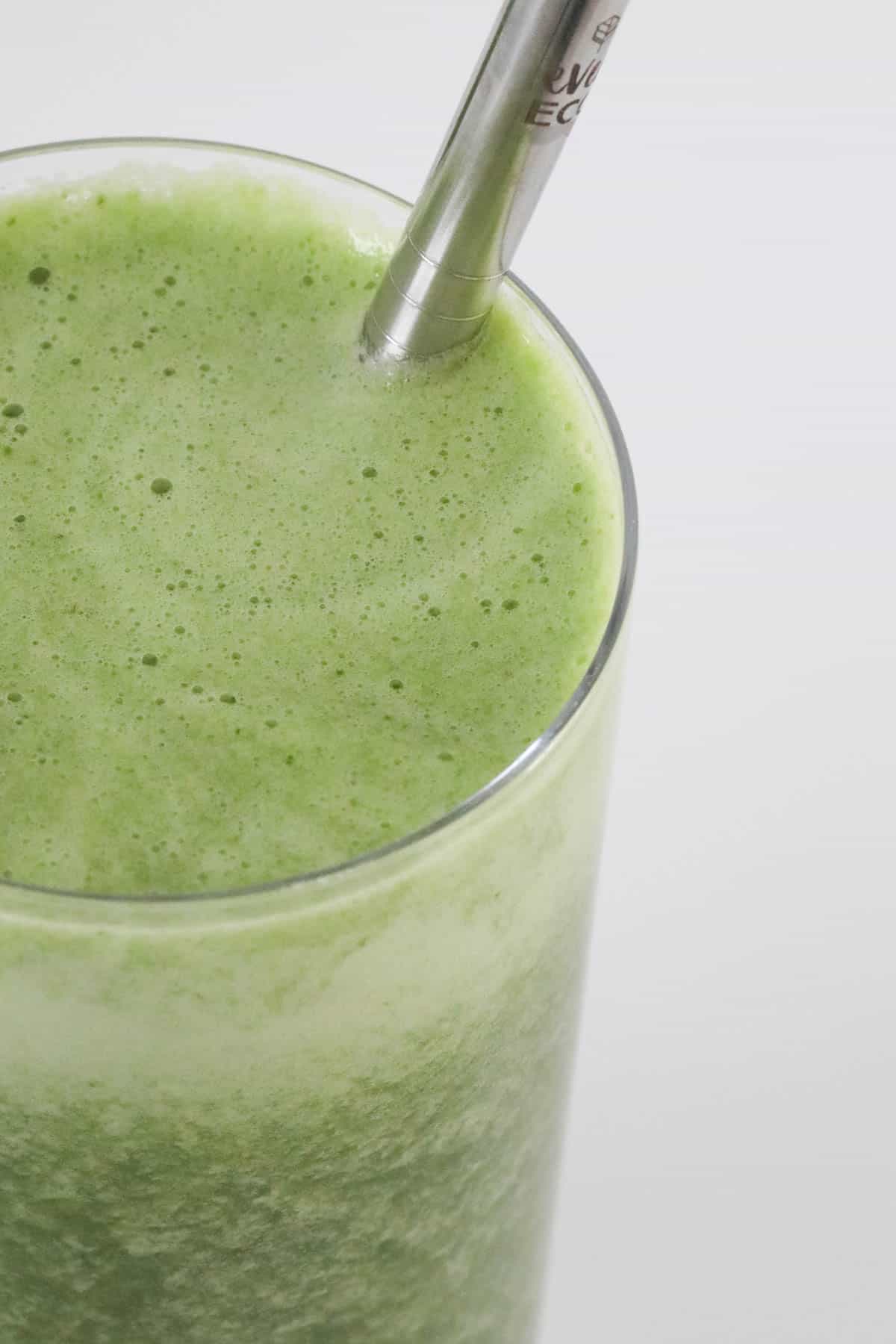 A healthy green juice in a glass.
