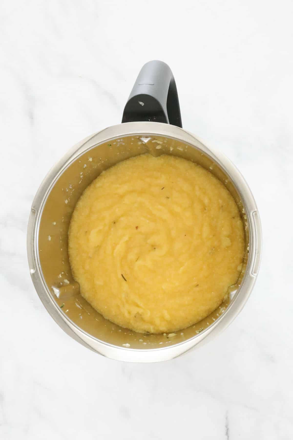 Polenta in a Thermomix bowl.