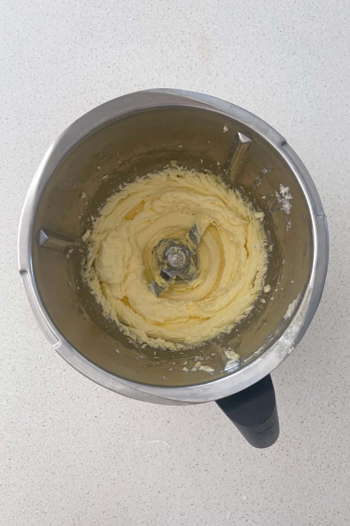Butter, sugar and vanilla extract combined in a thermomix bowl.