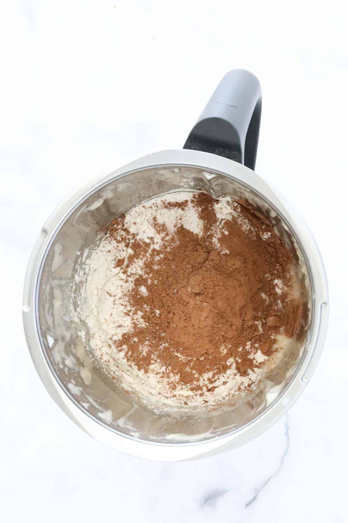 Cocoa powder on top of flour in a Thermomix.