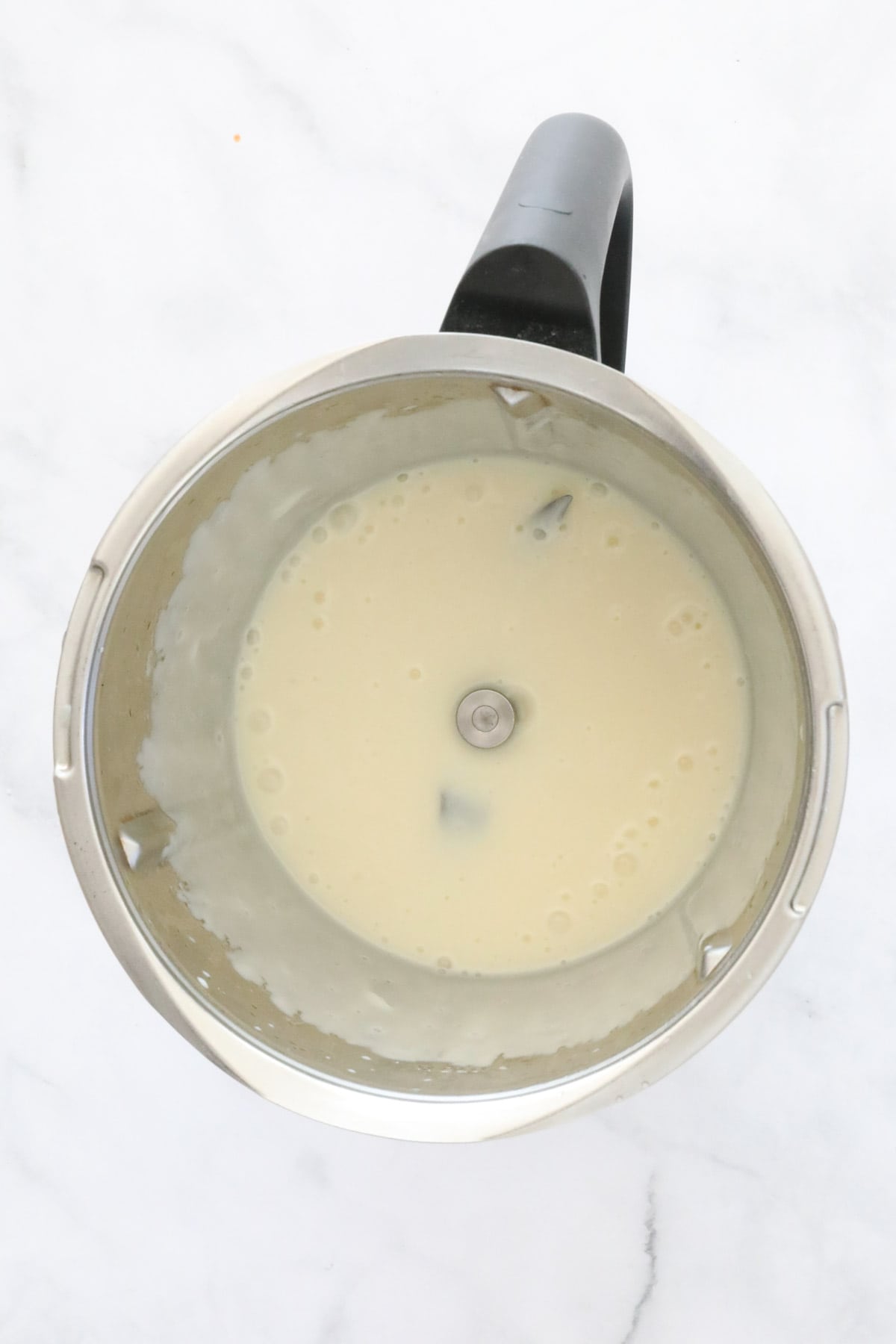 Creamy liquid in a Thermomix.