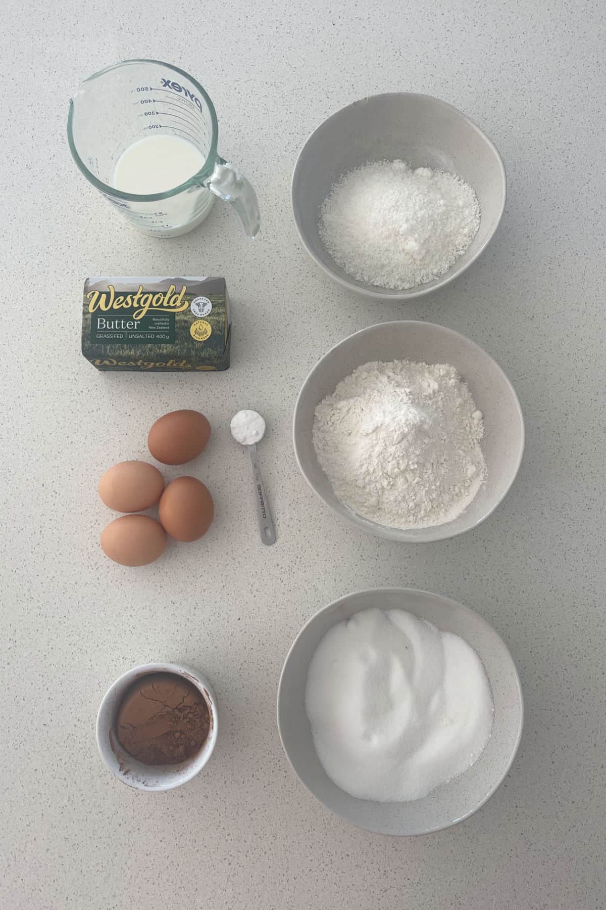 Ingredients to make a chocolate and coconut cake.