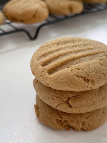 Three Ginger Biscuits stacked on top of each other.