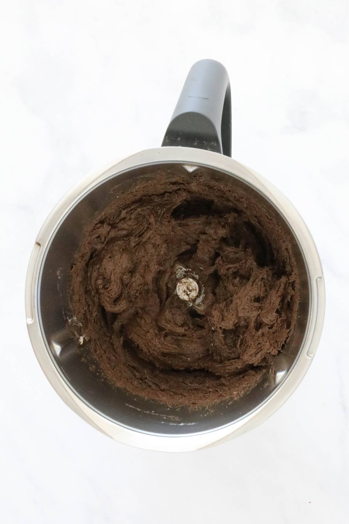 Chocolate cream cheese mixture in a Thermomix.