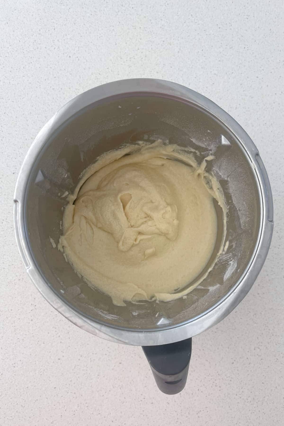 Cake batter in a Thermomix bowl.