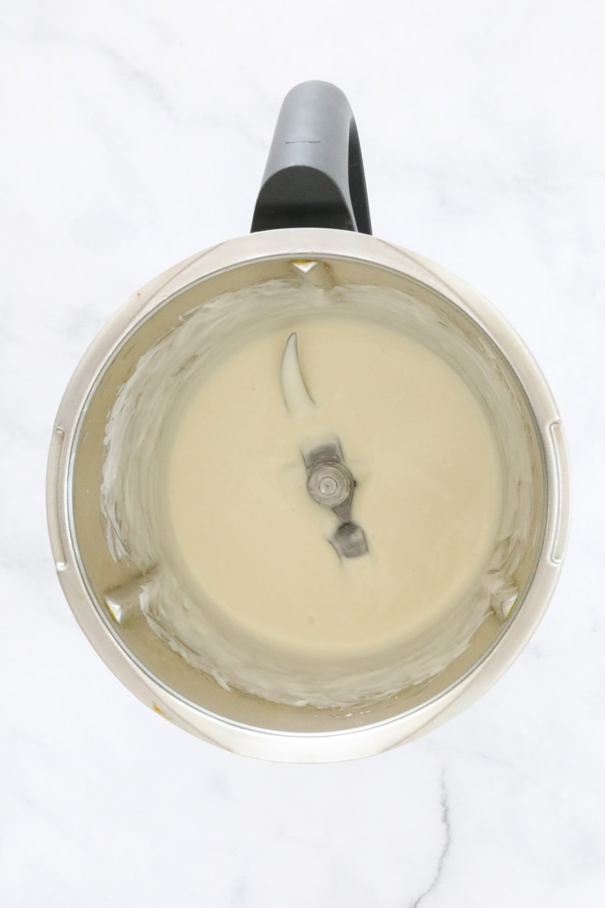Melted white chocolate in a Thermomix.