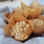 close up of apple muffin made in a thermomix sprinkled with rolled oats.
