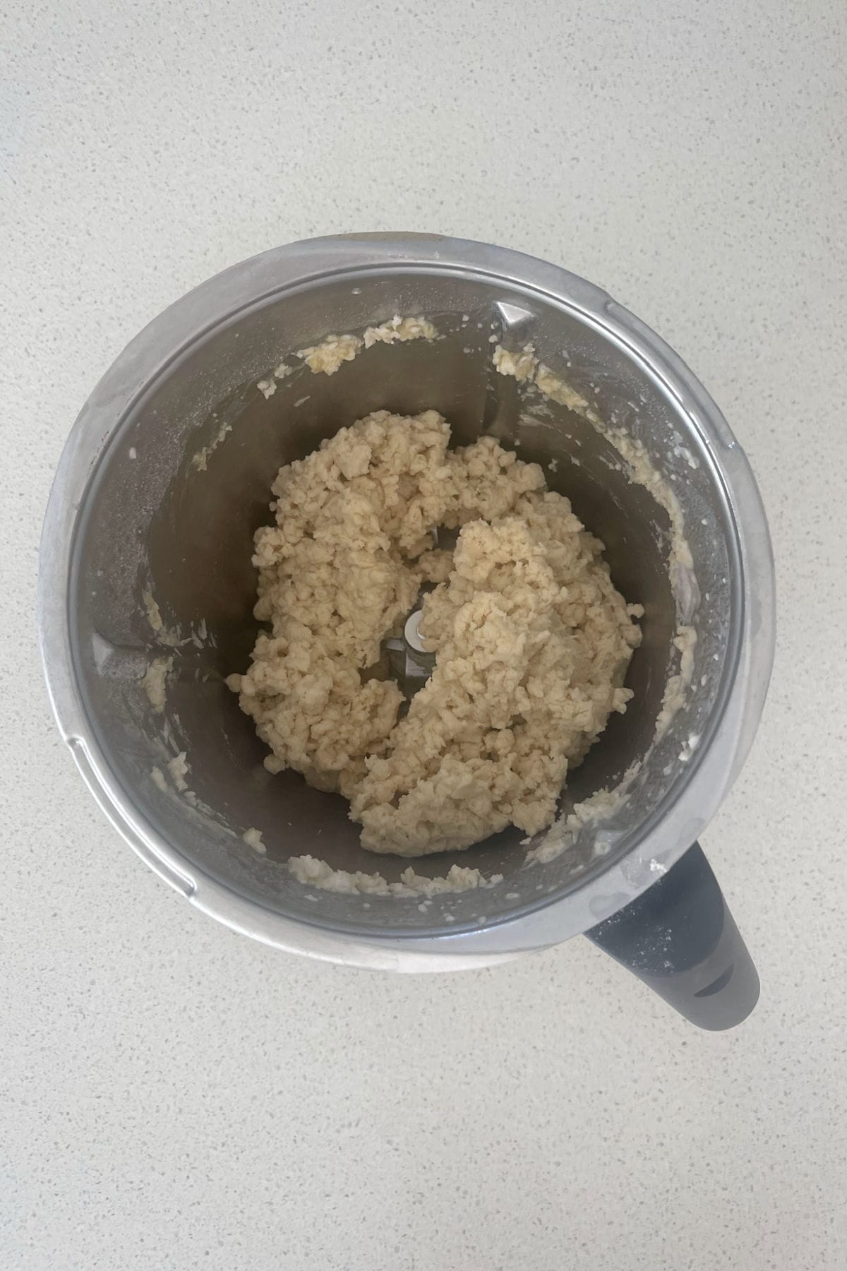 Combined tortilla ingredients in a Thermomix bowl.