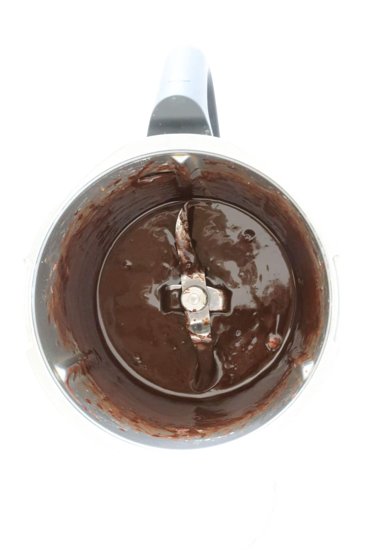 Melted chocolate in a Thermomix bowl.