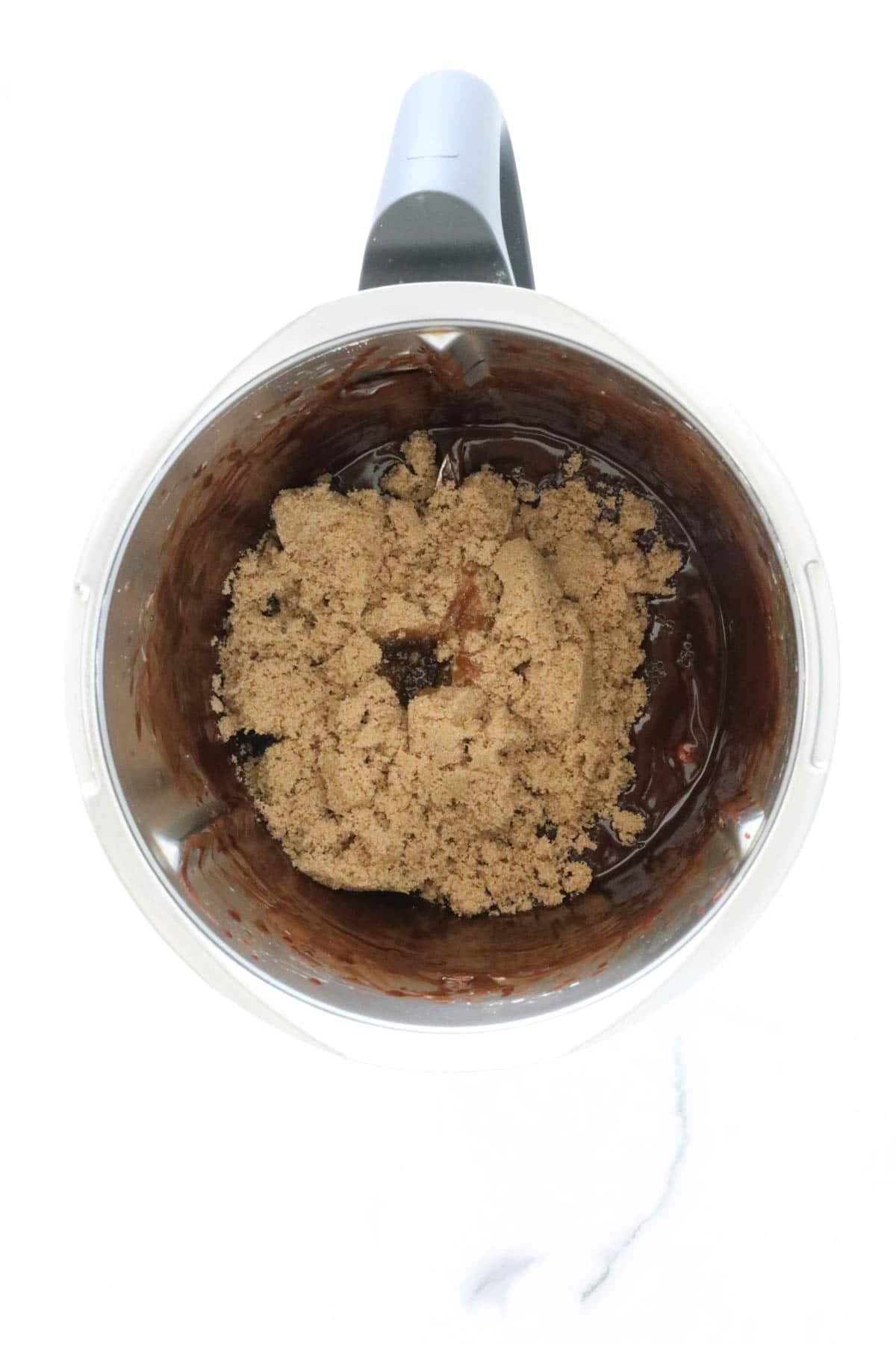 Brown sugar in a Thermomix bowl.