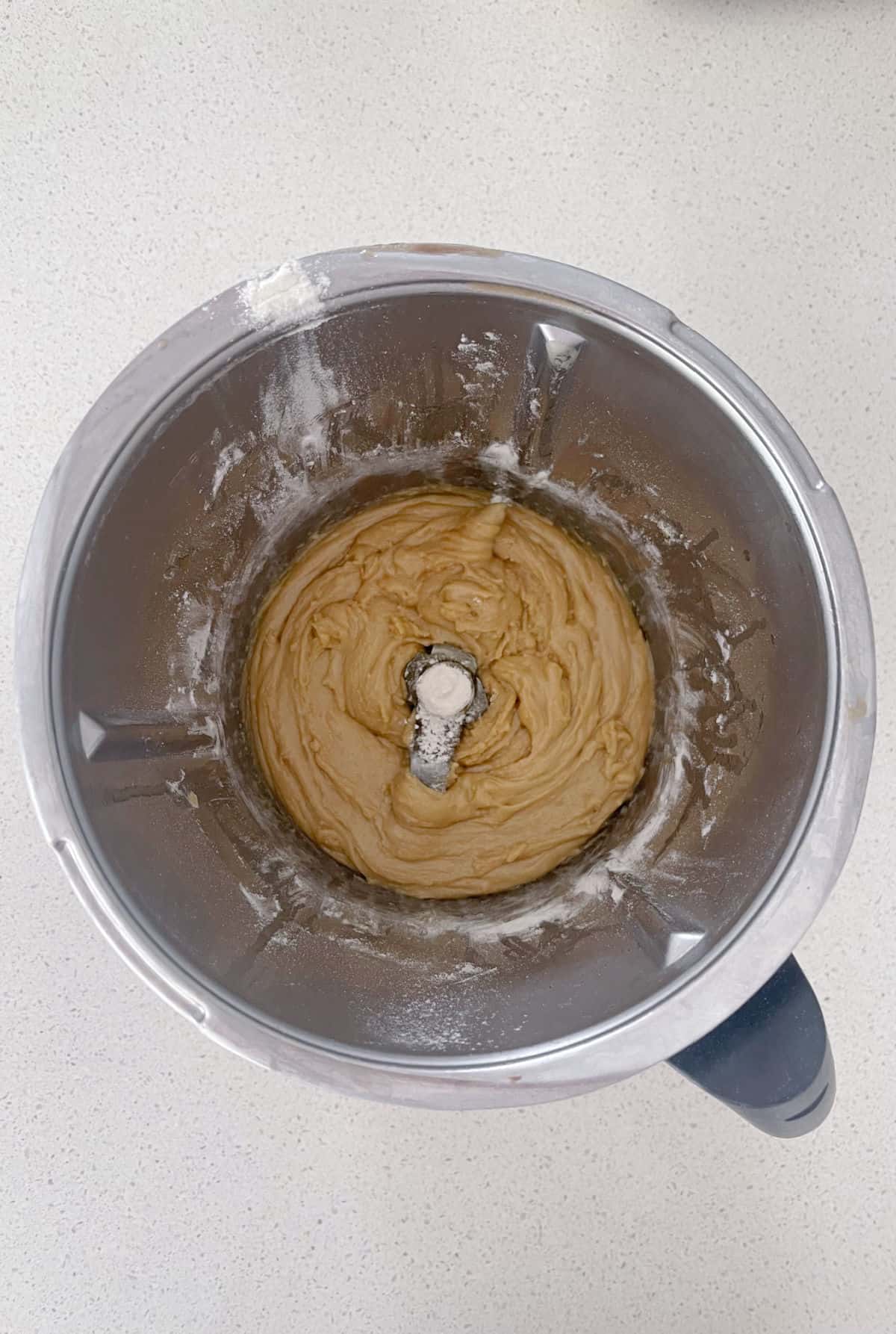 Combined caramel cookie dough in a Thermomix bowl.