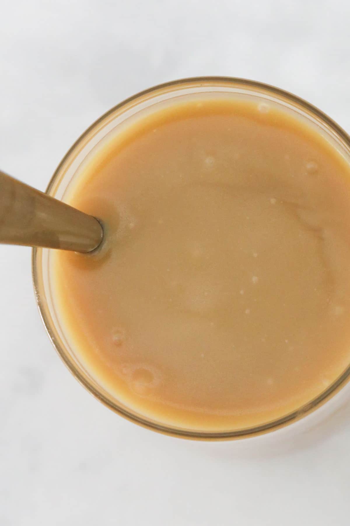 An overhead shot of butterscotch sauce.