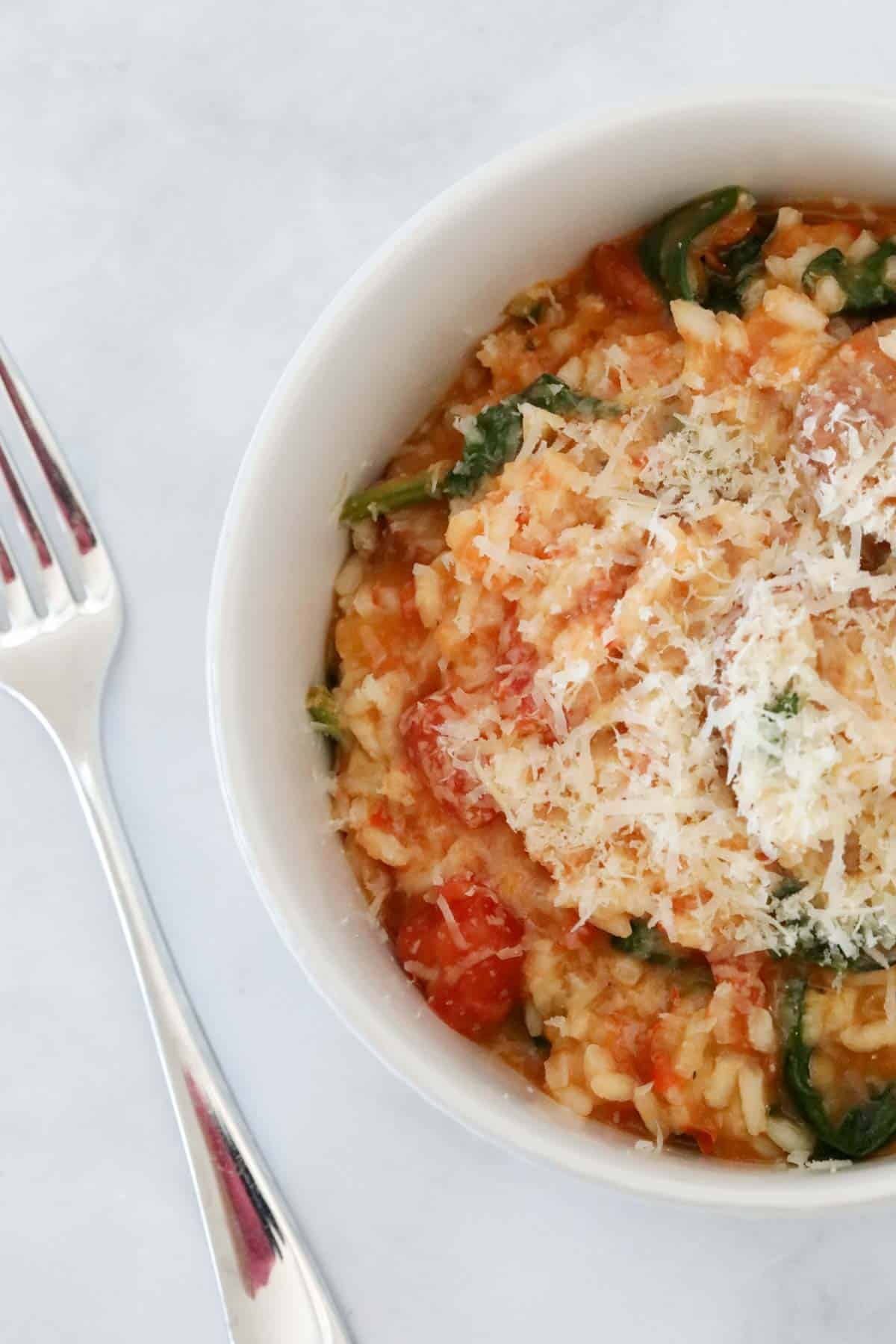 An overhead shot of tomato risotto.