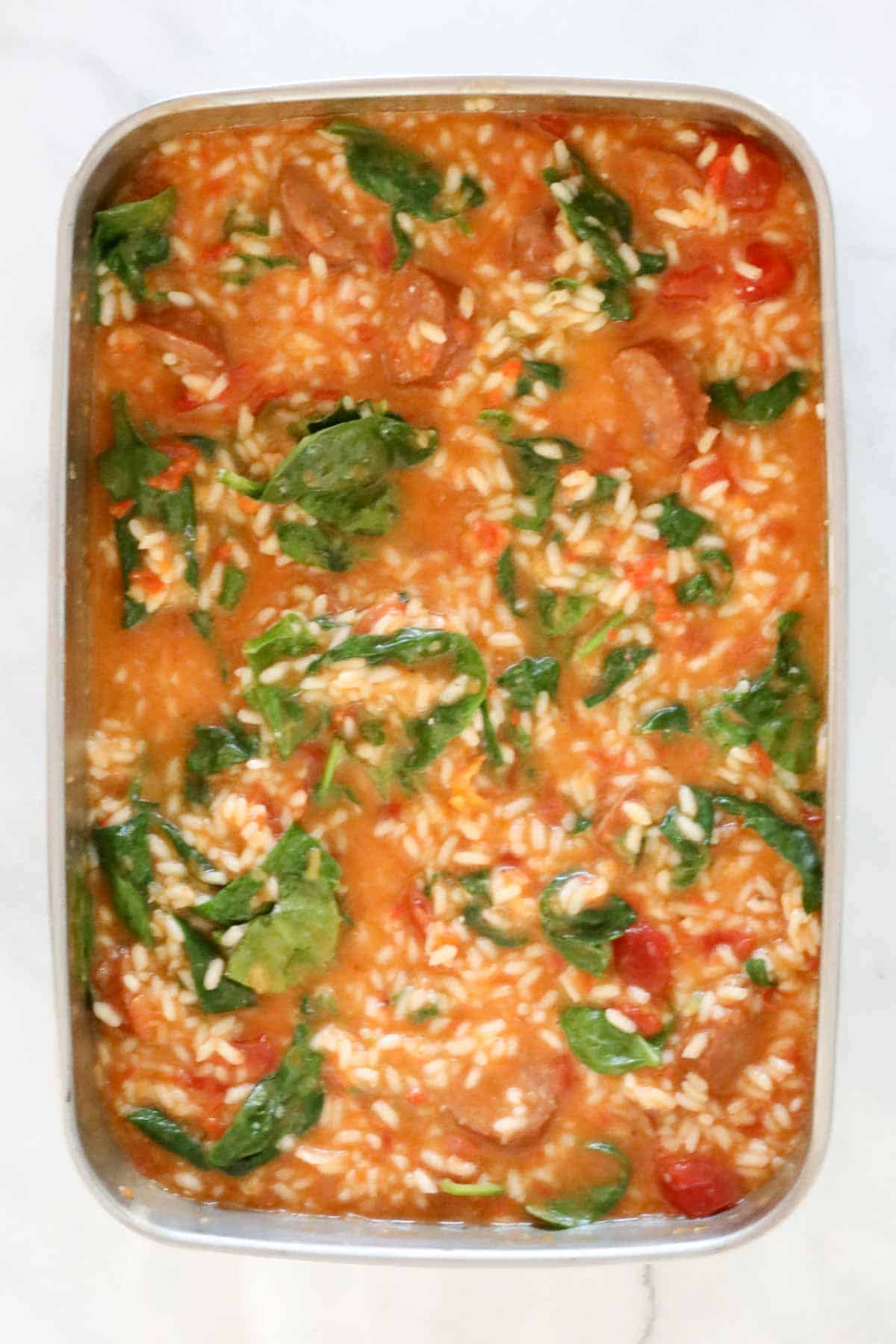 A Thermoserver filled with tomato and baby spinach risotto.