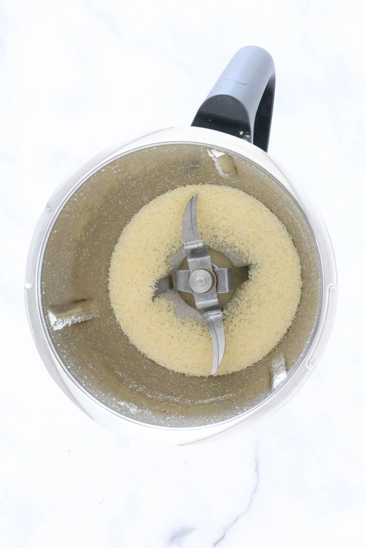 Grated parmesan in a Thermomix.