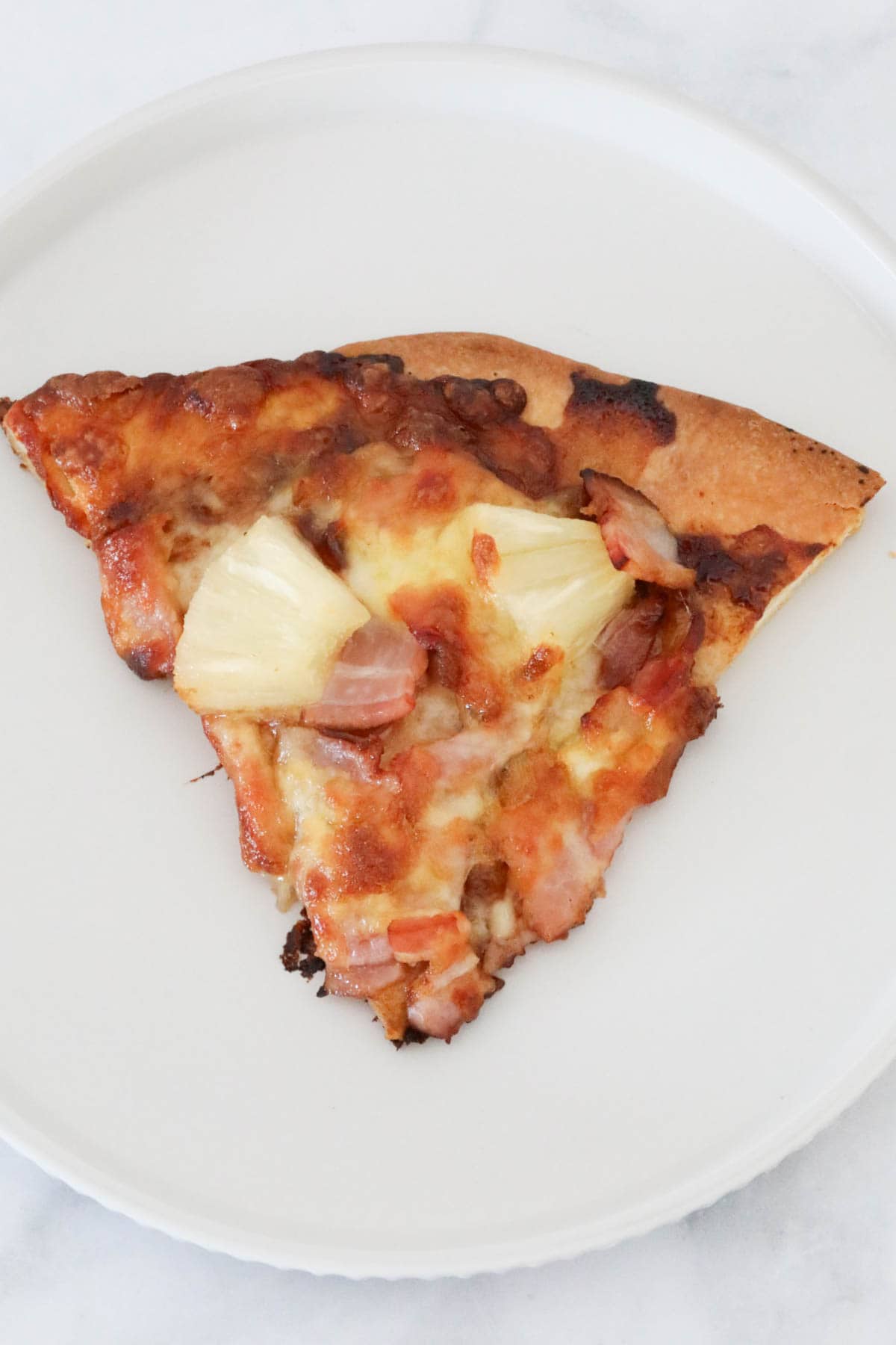 A Slice of Hawaiian pizza.