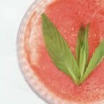 An overhead shot of a watermelon and mint drink.
