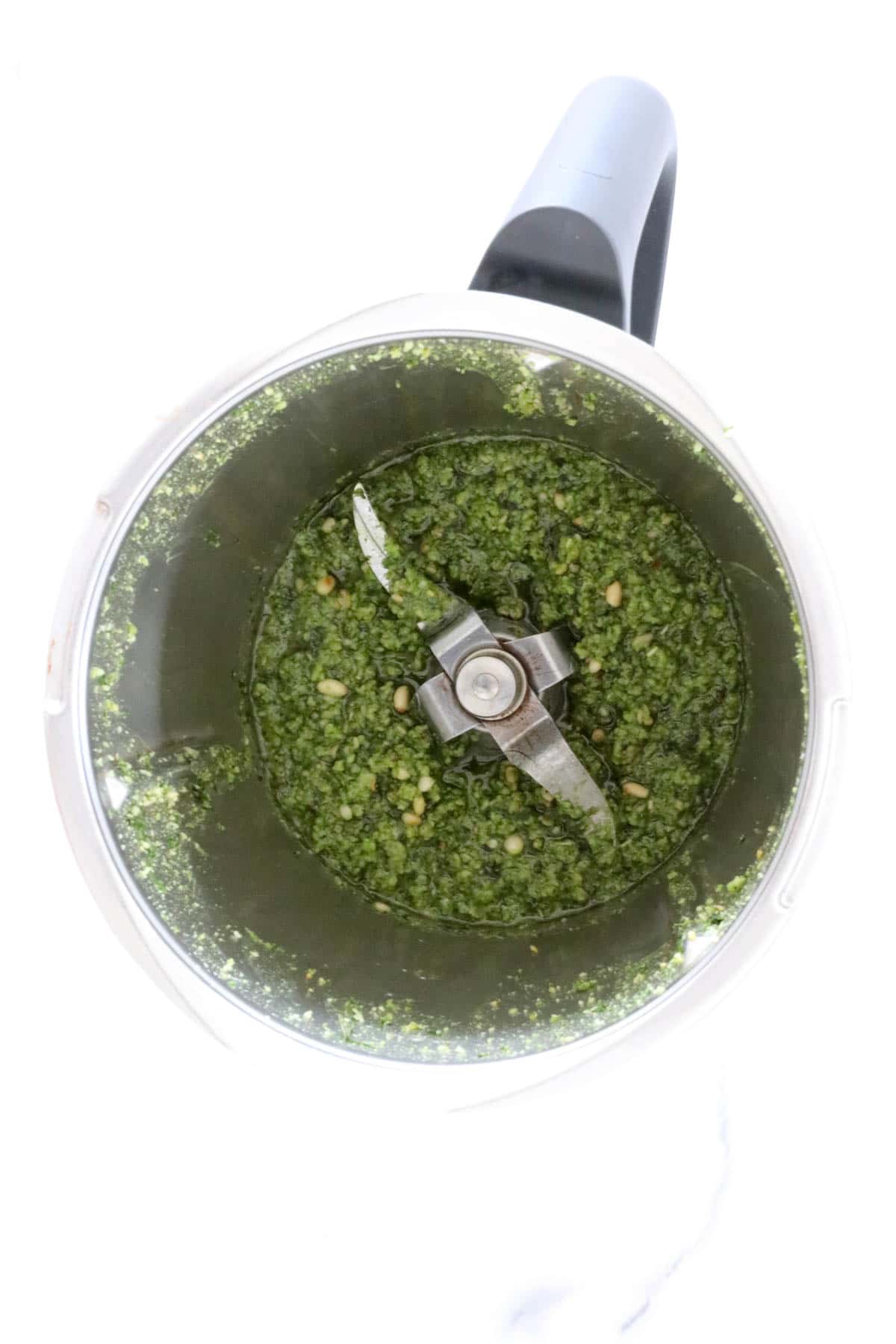 Basil pesto mixture in a Thermomix.