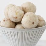 Cherry coconut balls in a bowl.