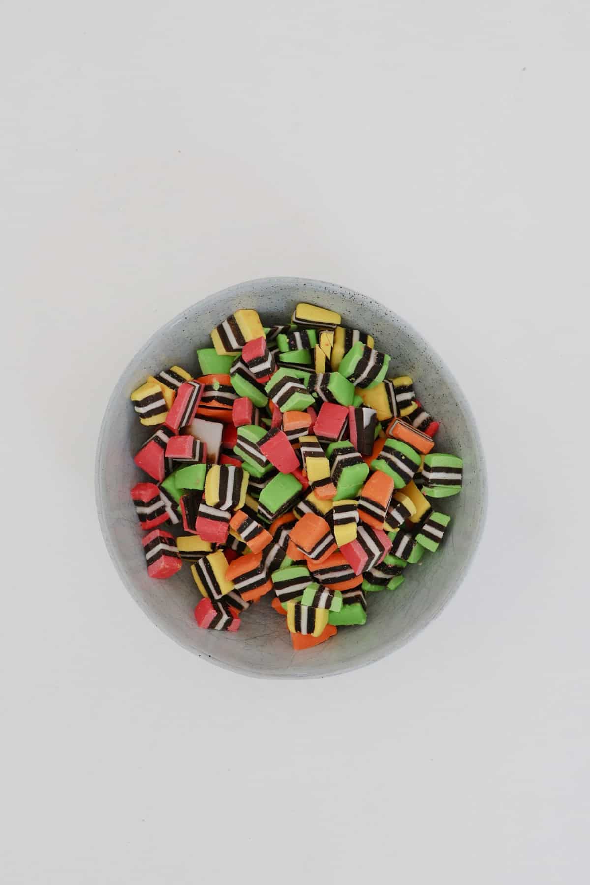 Bowl of chopped licorice all sort pieces.