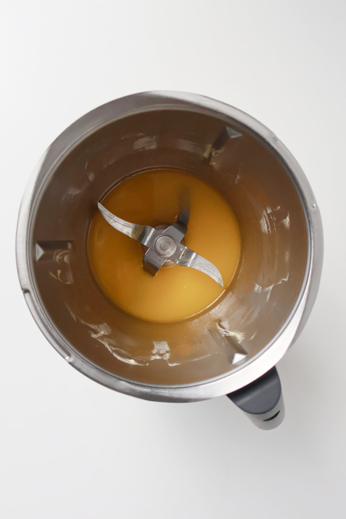 Melted butter in a thermomix bowl.