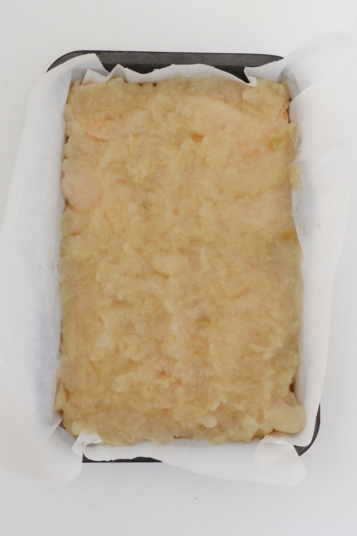 Apple layer of apple and sour cream slice.