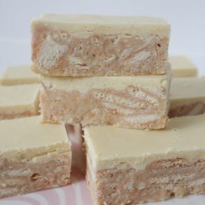 Slices of Thermomix White Chocolate Hedgehog Slice stacked on top of each other.