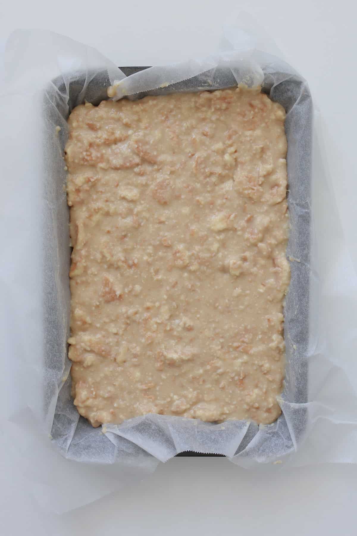 Thermomix white chocolate hedgehog slice in a baking dish.